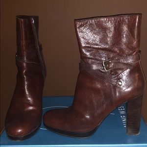 Dark brown leather booties.